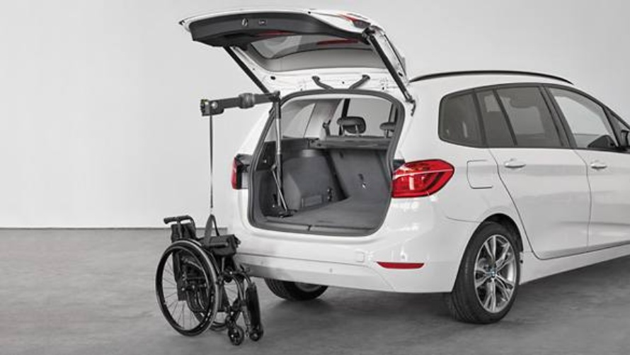 BMW Auto, intrigierte Fahrhilfe, Rollstuhlvorrichtung 